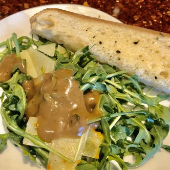 110 Grill Millbury - Arugula salad with fresh shaved parmesan and a side of toast with garlic butter. - American Near Me - Millbury, Massachusetts