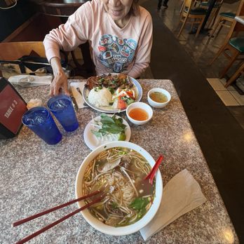 Pho Xe Lua - Mom enjoying the pork chop combo while I enjoy my number #1 pho - Vietnamese Near Me - Sacramento, California