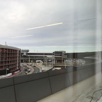AirTrain JFK - View outside the airport baggage claim area but on the second floor - Train Stations Near Me