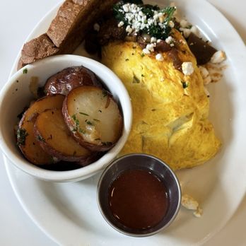 French Toast - OMELETTE WITH RATATOUILLE. CHEVRE & SPINACH - Breakfast & Brunch Near Me - New Orleans, Louisiana