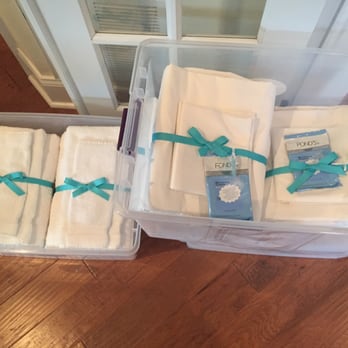 @Shore Service - Towels and sheets neatly folded, bundled with ribbon and labeled with bed size. - Beach Equipment Rentals Near Me - Avalon, New Jersey