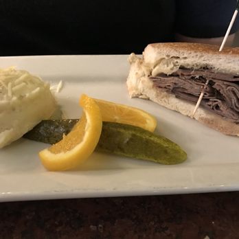 The Potpourri House - Half of a French Dip Sandwich with mashed potatoes - American Near Me - Tyler, Texas The Potpourri House - Half of a French Dip Sandwich with mashed potatoes - American Near Me - Tyler, Texas