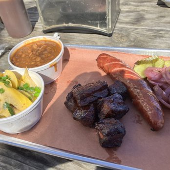Hurtado Barbecue - Burnt ends and sausage. Along with cheesy squash and baked beans - Barbeque Near Me - Arlington, Texas Hurtado Barbecue - Burnt ends and sausage. Along with cheesy squash and baked beans - Barbeque Near Me - Arlington, Texas
