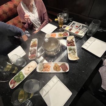 The Melting Pot - 4 entree orders plus sauce and broth - Fondue Near Me - Portland, Oregon