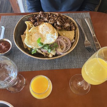 Red Tail Bar & Grill - Chilaquiles with Carne - New American Near Me - El Cajon, California Red Tail Bar & Grill - Chilaquiles with Carne - New American Near Me - El Cajon, California