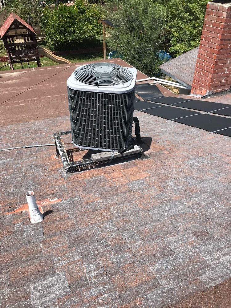 Slide of Mencho's Roofing & Repairs