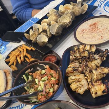Hamido Seafood - Butter garlic clam/Hamido Salad/Olive oil and garlic grilled calamari/Tahini/Seasoned Fries - Seafood Near Me - Astoria, New York Hamido Seafood - Butter garlic clam/Hamido Salad/Olive oil and garlic grilled calamari/Tahini/Seasoned Fries - Seafood Near Me - Astoria, New York