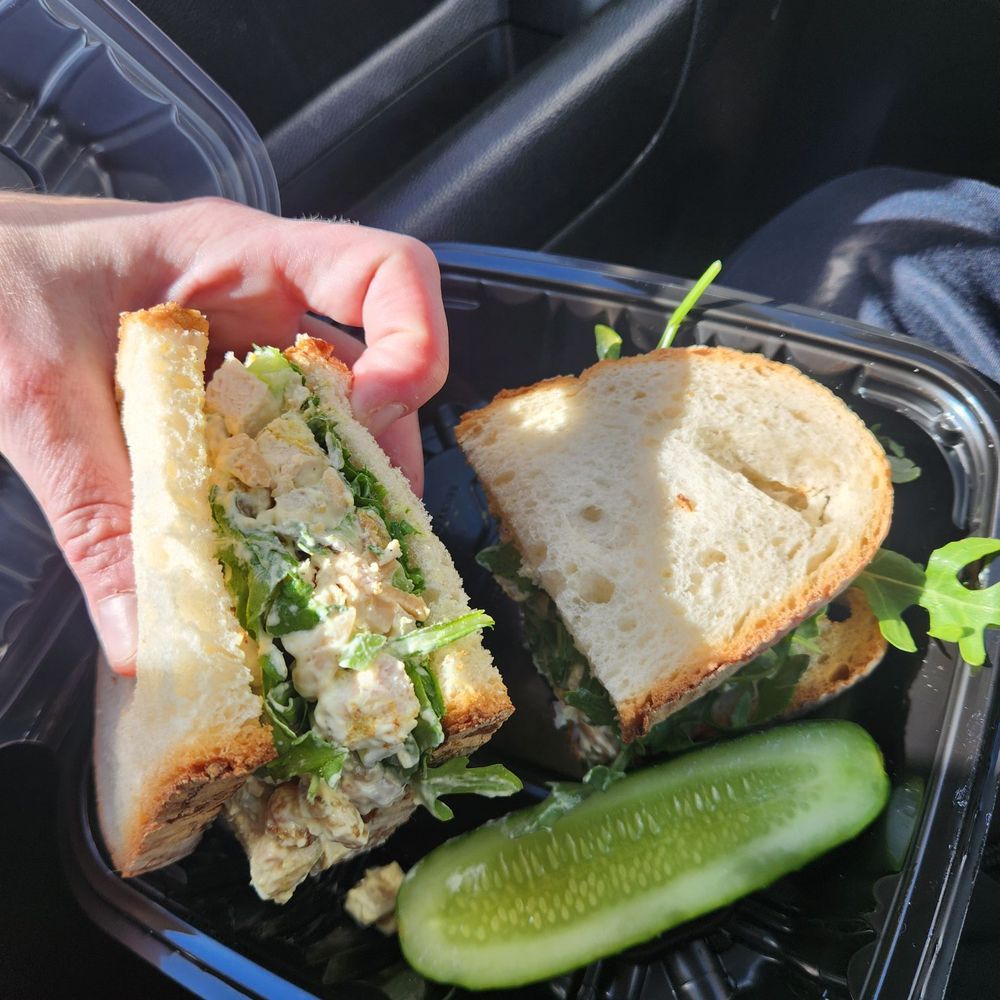 Artisan Eatery - Curry Chicken Salad Sandwich with pickle slice - New American Near Me - Fort Myers, Florida