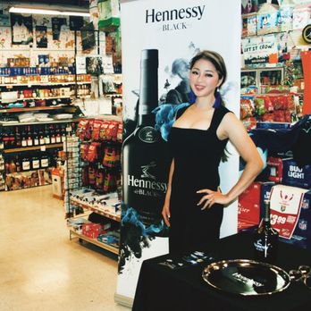 Oliveira's Liquors - a woman in a black dress in a store - Beer, Wine & Spirits Near Me - Newark, California Oliveira's Liquors - a woman in a black dress in a store - Beer, Wine & Spirits Near Me - Newark, California