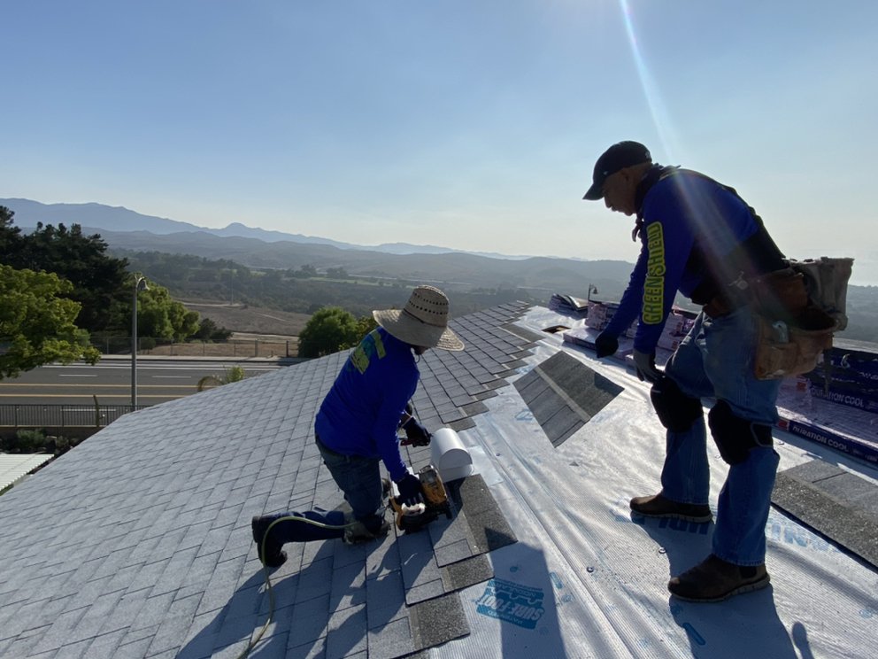 Slide of Green Shield Roofing