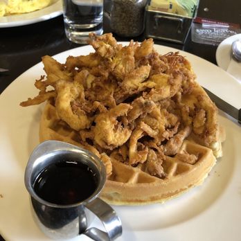 Light House Bistro - Chicken and waffles ... unique chicken flavor - mustard I think? - a bit salty for me. - American Near Me - Annapolis, Maryland Light House Bistro - Chicken and waffles ... unique chicken flavor - mustard I think? - a bit salty for me. - American Near Me - Annapolis, Maryland