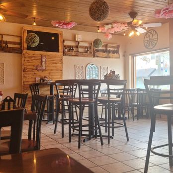 The Roots Restaurant Tavern - Indoor seating. Delightfully tacky as it looks like grandma's house. - Breakfast & Brunch Near Me - Melbourne, Florida