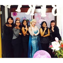 A Class Act Singing Telegrams - Elsa posing for pics
