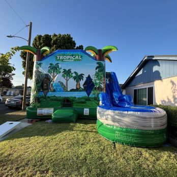 Orange County Jumpers - Whole front of Tropical Paradise jumper slide combo! Sooo nice and cool looking! We loved it! - Bounce House Rentals Near Me - Huntington Beach, California Orange County Jumpers - Whole front of Tropical Paradise jumper slide combo! Sooo nice and cool looking! We loved it! - Bounce House Rentals Near Me - Huntington Beach, California