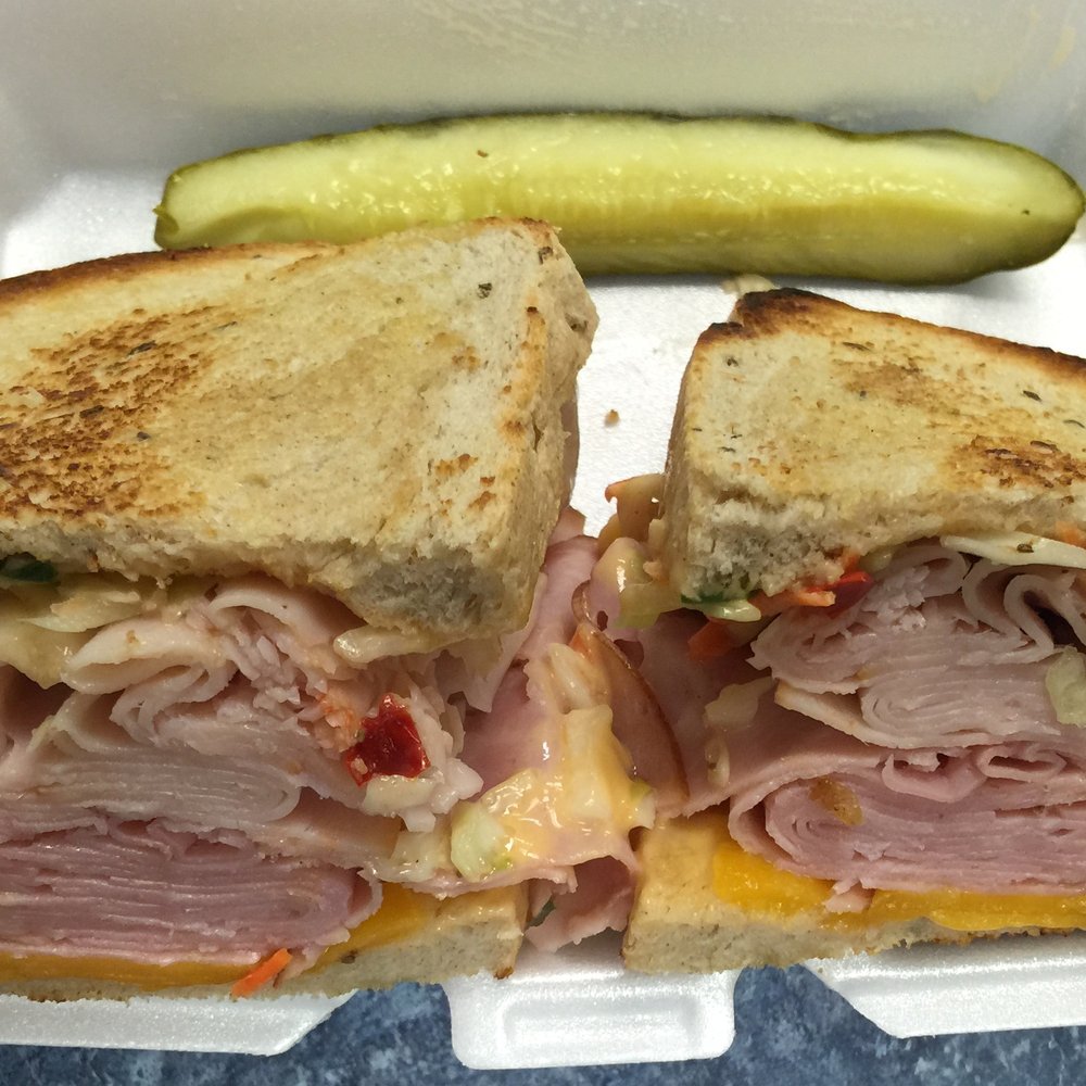 Schnitz Deli - The California Reuben takeout. "My lunch can beat up your lunch!" - Delis Near Me - Grand Rapids, Michigan Schnitz Deli - The California Reuben takeout. "My lunch can beat up your lunch!" - Delis Near Me - Grand Rapids, Michigan