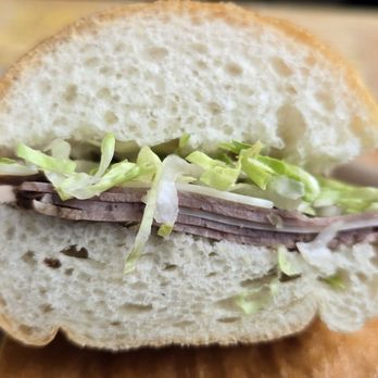 Angee B'z Subs - Roast beef and Swiss with lettuce on French bread - Wraps Near Me - Hartford, Wisconsin Angee B'z Subs - Roast beef and Swiss with lettuce on French bread - Wraps Near Me - Hartford, Wisconsin