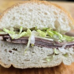 Angee B'z Subs - Roast beef and Swiss with lettuce on French bread