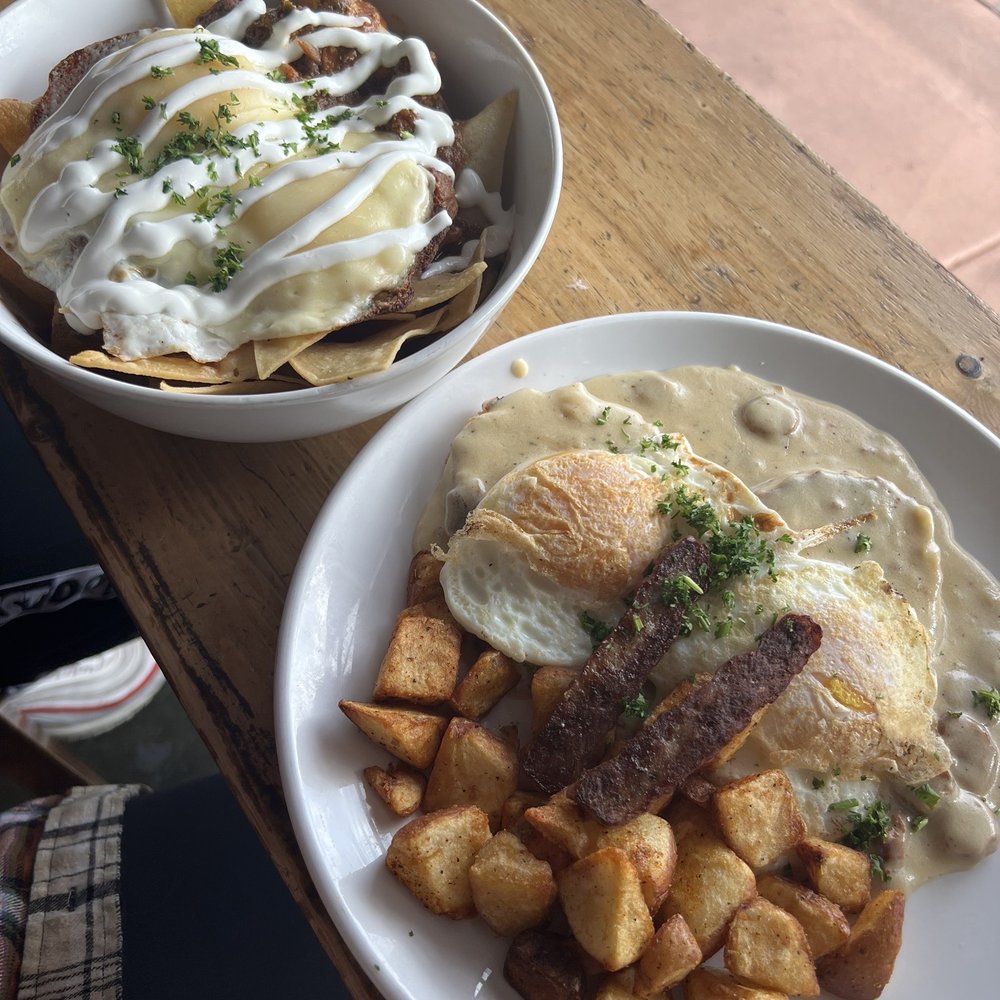 Luci's Marketplace - Chilaquiles(L) and sausage biscuits & gravy (R) - Cafes Near Me - Phoenix, Arizona
