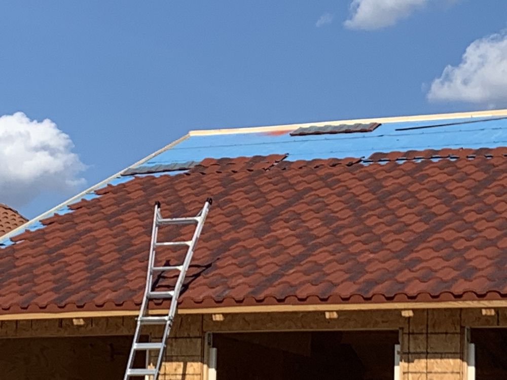 Slide of Top Notch Roofing