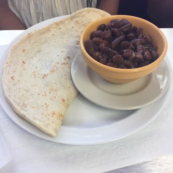 Delicias Latinas - a bowl of beans and a tortilla - Honduran Near Me - Miami, Florida Delicias Latinas - a bowl of beans and a tortilla - Honduran Near Me - Miami, Florida