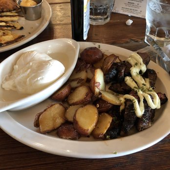 Toast - Steak and eggs with potatoes and poached eggs - Breakfast & Brunch Near Me - New Orleans, Louisiana Toast - Steak and eggs with potatoes and poached eggs - Breakfast & Brunch Near Me - New Orleans, Louisiana