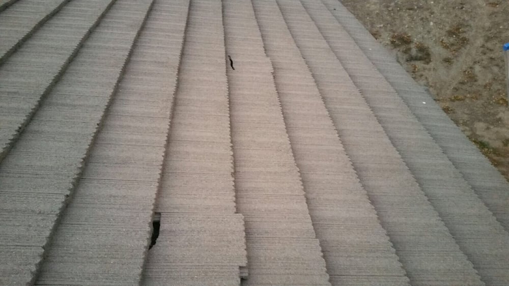 Slide of Atlas Roofing Company