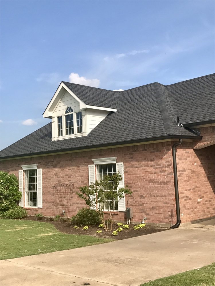 Slide of AM Roofing Company