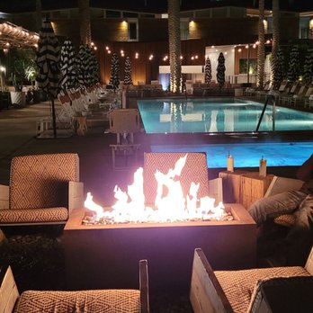 ARRIVE Palm Springs - There's nothing like sitting around a hot fire when it's 40 degree weather - Hotels Near Me - Palm Springs, California ARRIVE Palm Springs - There's nothing like sitting around a hot fire when it's 40 degree weather - Hotels Near Me - Palm Springs, California