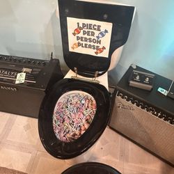 Maxwell's House of Music - A toilet that you could get candy from !