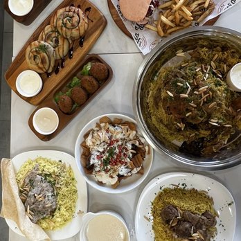 Yalla Nakol - a table full of food - Middle Eastern Near Me - Windsor, Ontario
