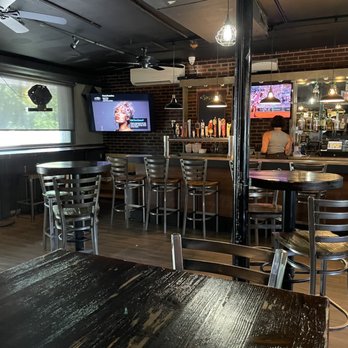The Perky - a bar with wooden tables and chairs - Pool Halls Near Me - Phoenixville, Pennsylvania