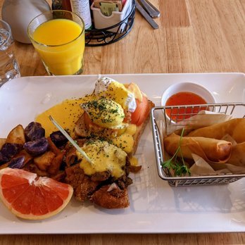 Sistory - Fresh OJ Sister Benedict: poached eggs, crispy chicken thigh, tomatoes, red and green onions, hollondaise sauce, toast. Side of egg rolls. - Thai Near Me - Albany, California Sistory - Fresh OJ Sister Benedict: poached eggs, crispy chicken thigh, tomatoes, red and green onions, hollondaise sauce, toast. Side of egg rolls. - Thai Near Me - Albany, California
