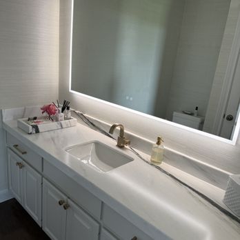 Emerald Granite Works - pictures of remodeled powder room and kitchen island - Countertop Installation Near Me - Spicewood, Texas