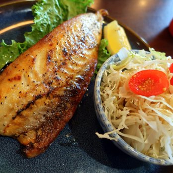 Nomiya - a plate of fish and a salad - Sushi Bars Near Me - Edmonton, Alberta