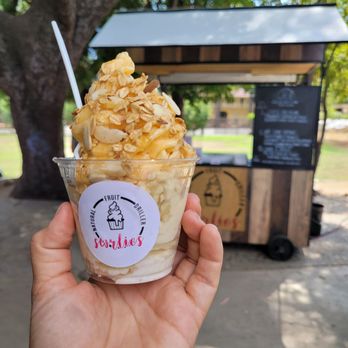 Swrlies - a hand holding a cup of ice cream - Ice Cream & Frozen Yogurt Near Me - Los Angeles, California