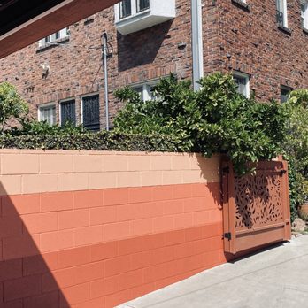 Faux Real Paint - Exterior wall mural and gate - Painters Near Me