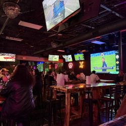 Michelobos Restaurant & Sports Bar - Tables inside and TVs