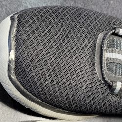 SKECHERS Warehouse Outlet - Peeling on the front of the right shoe.