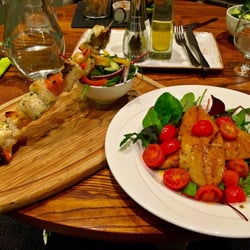 Mason's Restaurant - Feast: mixed seafood Kebob & grilled mackerel salad, side of vegetables off in the distance