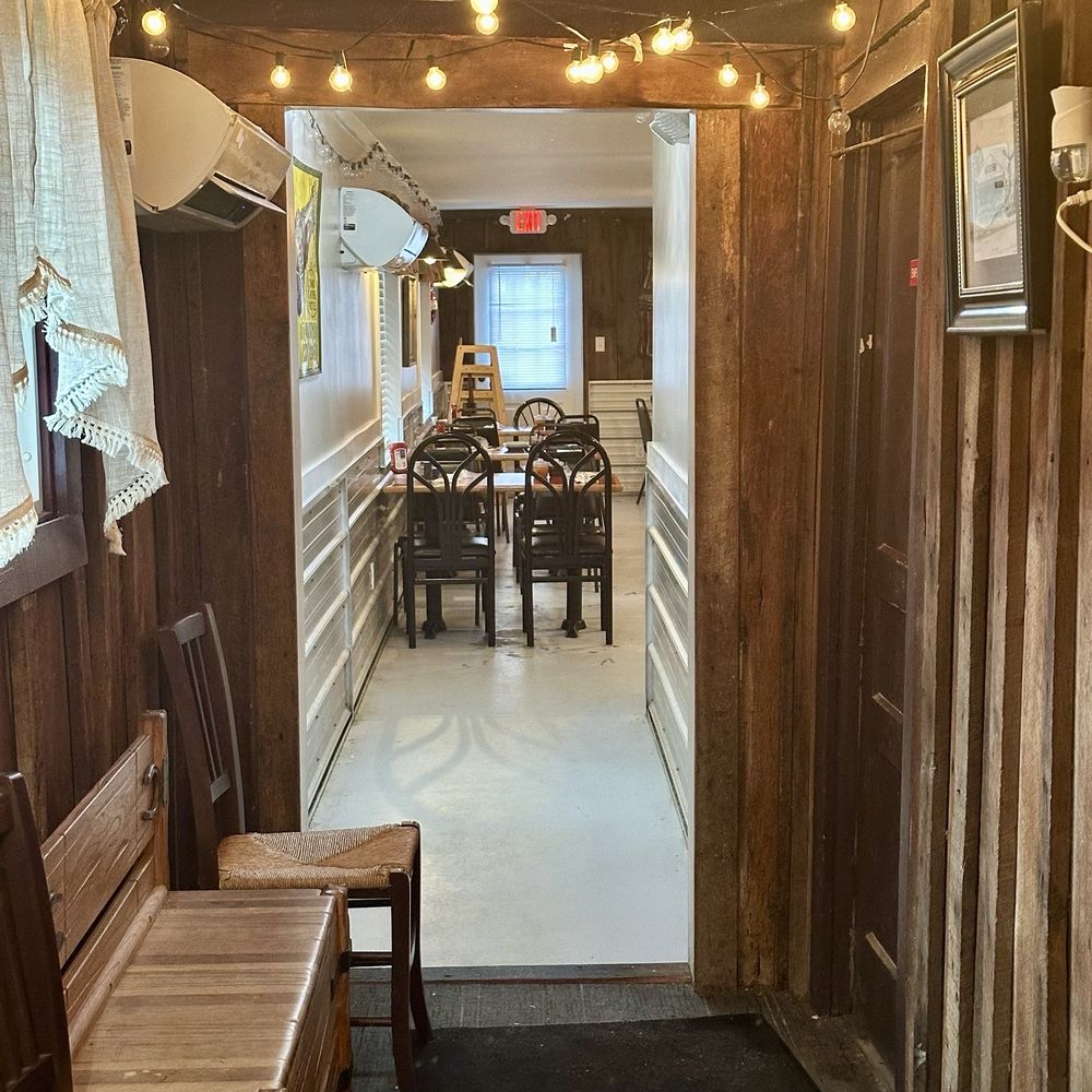 Beacon Light Tea Room - The hallway connecting the front of the restaurant to the back. There's much more seating than you think. - Tea Rooms Near Me - Bon Aqua, Tennessee