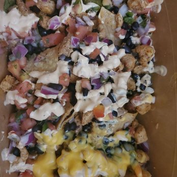 Taco Taco Mexican - Chicken nachos, asked for queso on the side and sprinkled on as I was eating. So delicious and filling! - Mexican Near Me - Philadelphia, Pennsylvania Taco Taco Mexican - Chicken nachos, asked for queso on the side and sprinkled on as I was eating. So delicious and filling! - Mexican Near Me - Philadelphia, Pennsylvania