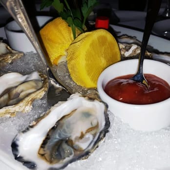 High Steaks - Chilled Oysters: Red Cocktail Sauce, Dandelion Mignoelle with some lemons and an adorable tiny Tabasco sauce jar!!! - Steakhouses Near Me - Lincoln, California High Steaks - Chilled Oysters: Red Cocktail Sauce, Dandelion Mignoelle with some lemons and an adorable tiny Tabasco sauce jar!!! - Steakhouses Near Me - Lincoln, California