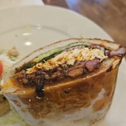 Tulcingo Restaurant - Torta Con Al Pastor. Toppings were good but where's the spice? Meat was bland