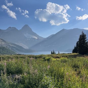 Assiniboine Lodge - View of Magog Lake and Mt Assiniboine from the lodge porch. Slightly smoky day but otherwise gorgeous September weather - Hotels Near Me