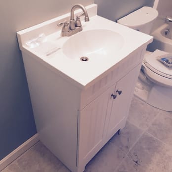 Shaffer Construction - a bathroom with a sink and toilet - General Contractors Near Me Shaffer Construction - a bathroom with a sink and toilet - General Contractors Near Me