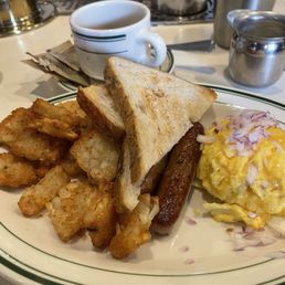 Scrambled eggs with red onions sprinkled on top because the chef fulfilled my request, sausage, toast, and these amazing hashbrowns. Scrambled eggs with red onions sprinkled on top because the chef fulfilled my request, sausage, toast, and these amazing hashbrowns.