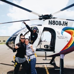 Jack Harter Helicopters - Bruno our pilot and my husband and I!