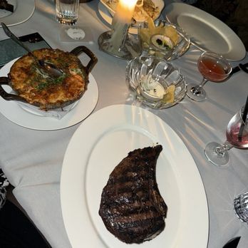 Maple & Ash - Yukon Gold Potatoes au Gratin 28 Day Dry-Aged Bone-In Ribeye - Steakhouses Near Me - Chicago, Illinois Maple & Ash - Yukon Gold Potatoes au Gratin 28 Day Dry-Aged Bone-In Ribeye - Steakhouses Near Me - Chicago, Illinois