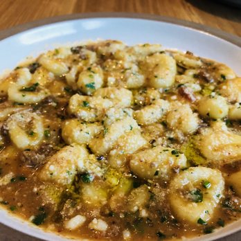 Tavernetta - Gnocchi with a lamb ragu sauce. Melt in your mouth good. - Italian Near Me - Denver, Colorado Tavernetta - Gnocchi with a lamb ragu sauce. Melt in your mouth good. - Italian Near Me - Denver, Colorado
