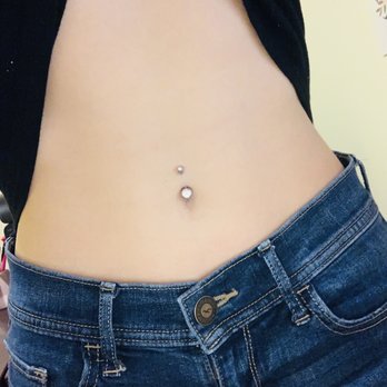 Studio 54 Tattoo - Navel piercing - Tattoo Near Me - Lutz, Florida Studio 54 Tattoo - Navel piercing - Tattoo Near Me - Lutz, Florida
